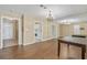 Open living area features hard wood floors, chandelier, and an abundance of natural light at 4701 N Kings Hwy. # 8, Myrtle Beach, SC 29577