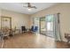 Living room featuring hardwood floors and access to the backyard at 4701 N Kings Hwy. # 8, Myrtle Beach, SC 29577