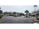 Exterior view of multi-story apartment buildings, showcasing the community's well-maintained parking and landscaping at 4719 Cobblestone Dr. # C4, Myrtle Beach, SC 29575