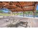 Open-air pavilion with picnic tables, ceiling fans, and a view of the community's recreational area at 4726 Southern Trail, Myrtle Beach, SC 29579