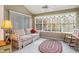Bright sunroom with large windows, comfortable seating, and a relaxing atmosphere at 4726 Southern Trail, Myrtle Beach, SC 29579