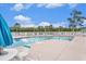 Inviting community swimming pool surrounded by lounge chairs, perfect for relaxation and recreation at 4726 Southern Trail, Myrtle Beach, SC 29579