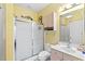 Bathroom with a white shower, toilet, sink, and light wood colored vanity and cabinet at 4865 Luster Leaf Circle # 402, Myrtle Beach, SC 29577