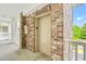 Brick-accented elevator with easy access to all floors, enhancing convenience for residents at 4865 Luster Leaf Circle # 402, Myrtle Beach, SC 29577