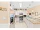 Modern kitchen with stainless steel appliances, white cabinets, and granite countertops at 4865 Luster Leaf Circle # 402, Myrtle Beach, SC 29577