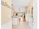 Inviting entryway flows into a bright living space with hardwood floors and modern decor at 4865 Luster Leaf Circle # 402, Myrtle Beach, SC 29577