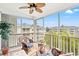 Relaxing screened porch featuring comfortable seating and a view of the community at 4865 Luster Leaf Circle # 402, Myrtle Beach, SC 29577