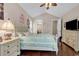 Cozy bedroom with hardwood floors, vaulted ceiling, and a matching furniture set at 487 Trestle Way, Conway, SC 29526