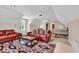 A spacious bonus room with plush furniture, a bed, and carpeted floors at 487 Trestle Way, Conway, SC 29526