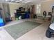 Well-organized garage featuring ample storage and room for a golf cart and equipment at 487 Trestle Way, Conway, SC 29526