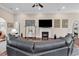 Inviting living room with fireplace, plush seating, and open access to other living spaces at 487 Trestle Way, Conway, SC 29526