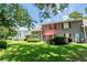 Charming home featuring a well-maintained backyard with green lawn and a patio area perfect for relaxing at 503 20Th Ave. N # 9D, North Myrtle Beach, SC 29582
