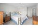 Bright bedroom with ceiling fan, comfortable bed, carpet and access to an ensuite bathroom at 503 20Th Ave. N # 9D, North Myrtle Beach, SC 29582
