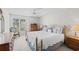 Bright bedroom with large bed, carpet, and large window allowing natural light at 503 20Th Ave. N # 9D, North Myrtle Beach, SC 29582