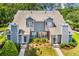 An overhead exterior of a two-story townhouse with dormer windows and landscaping at 503 20Th Ave. N # 9D, North Myrtle Beach, SC 29582