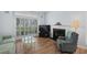 Cozy living room with fireplace, plantation shutters, and modern decor at 503 20Th Ave. N # 9D, North Myrtle Beach, SC 29582