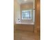 The bathroom featuring a tub with a window view and a separate shower at 5310 Pauley Swamp Rd., Conway, SC 29527