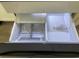 The freezer drawer is filled with ice. Ice and a partitioned drawer add storage versatility at 5310 Pauley Swamp Rd., Conway, SC 29527