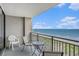 Balcony with ocean view, with seating perfect for relaxing and enjoying the scenery at 5523 N Ocean Blvd. # 1410, Myrtle Beach, SC 29577