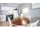 Cozy eat-in kitchen with white appliances, and dining area perfect for enjoying meals at home at 5523 N Ocean Blvd. # 1410, Myrtle Beach, SC 29577