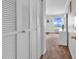 Bright bedroom with ocean view window and white closet doors provides a serene retreat at 5601 N Ocean Blvd. # A309, Myrtle Beach, SC 29577