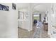 Inviting entryway with tile floors, leading into the living area with great natural light at 5801 Oyster Catcher Dr. # 431, North Myrtle Beach, SC 29582