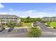 View of the condominium complex showing parking and landscaping at 5801 Oyster Catcher Dr. # 431, North Myrtle Beach, SC 29582