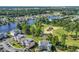 Aerial view of waterfront condos overlooking a golf course and winding waterway at 605 Waterway Village Blvd. # 31A, Myrtle Beach, SC 29579