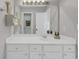 Bathroom featuring white vanity and large mirror at 605 Waterway Village Blvd. # 31A, Myrtle Beach, SC 29579
