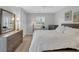 Bedroom with dresser and large bed, with soft natural light from window at 605 Waterway Village Blvd. # 31A, Myrtle Beach, SC 29579