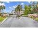 Community entrance with signage, mature trees, and well-maintained landscaping at 605 Waterway Village Blvd. # 31A, Myrtle Beach, SC 29579