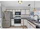 Functional kitchen featuring granite countertops, stainless steel appliances, and updated cabinetry at 605 Waterway Village Blvd. # 31A, Myrtle Beach, SC 29579