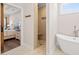 Stylish bathroom with a walk-in shower, soaking tub, and modern fixtures at 609 Mccown Dr., Conway, SC 29526