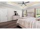 Spacious bedroom with tray ceiling, hardwood floors, and a bright window view at 609 Mccown Dr., Conway, SC 29526