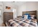 Cozy bedroom featuring a wood-framed bed, ample storage, and natural light at 609 Mccown Dr., Conway, SC 29526