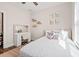 Charming bedroom featuring a stylish vanity, modern decor, and a comfortable bed with decorative pillows at 609 Mccown Dr., Conway, SC 29526