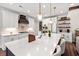 Bright kitchen featuring a large island, white cabinetry, and modern appliances at 609 Mccown Dr., Conway, SC 29526