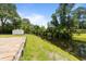 Picturesque backyard featuring a scenic canal bordered by lush greenery at 6204 Sancindy Ln., Myrtle Beach, SC 29572