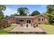 Backyard with a patio, outdoor grill, shed and lush green space at 6204 Sancindy Ln., Myrtle Beach, SC 29572