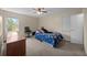 Bedroom with a bed, closet, desk chair and window at 6204 Sancindy Ln., Myrtle Beach, SC 29572