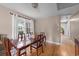 Comfortable dining room featuring a wood table and flooring, perfect for Gathering gatherings at 6204 Sancindy Ln., Myrtle Beach, SC 29572