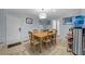 Dining room with tile flooring, light blue walls and view to the Kitchen at 6204 Sancindy Ln., Myrtle Beach, SC 29572