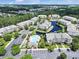 Aerial view of community featuring manicured grounds, ponds, and a sparkling community pool at 6253 Catalina Dr. # 1711, North Myrtle Beach, SC 29582