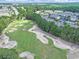 Aerial view of community featuring golf course, lush landscape, and well-maintained buildings at 6253 Catalina Dr. # 1711, North Myrtle Beach, SC 29582