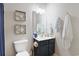 Bathroom featuring a white vanity, decorative mirror and nautical themed decorations at 6253 Catalina Dr. # 1711, North Myrtle Beach, SC 29582