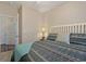 Bedroom featuring bed, side table with lamp, and an open door to another room at 6253 Catalina Dr. # 1711, North Myrtle Beach, SC 29582