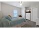 Inviting bedroom featuring a ceiling fan, closet and comfortable-looking bed at 6253 Catalina Dr. # 1711, North Myrtle Beach, SC 29582