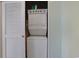 A laundry closet contains a stacked washer and dryer unit, providing convenience and space-saving functionality at 6253 Catalina Dr. # 1711, North Myrtle Beach, SC 29582
