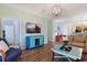 Open-concept living area with hardwood floors, modern furniture, and a view into the kitchen at 6253 Catalina Dr. # 1711, North Myrtle Beach, SC 29582