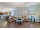 A bright living room with hardwood floors, contemporary furniture, and an open layout at 6253 Catalina Dr. # 1711, North Myrtle Beach, SC 29582